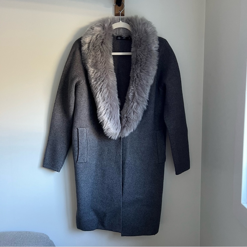 Coat with faux fur trim